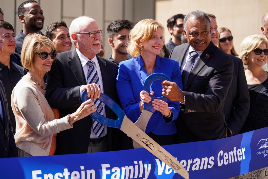 From left, Phyllis Epstein, Dan Epstein, President Ellen Neufeldt and CSUSM Foundation Board Chair Tony Jackson participate in the ribbon-cutting to celebrate the opening of the Epstein Family Veterans Center. (Photo by Andrew Reed)