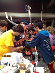 The San Dieguito High School Academy team works on its robot.