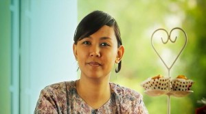Erin Radzi of Malaysia was able to start a baking business through Qualcomm Inc.'s Wireless Reach program.