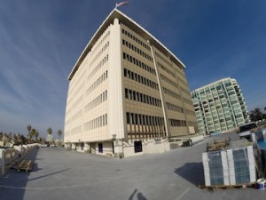 The left side of the building is finished. The right side shows the original face.