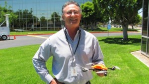 SDG&E project manager Dallas Cormier holds one of the unmanned aircraft. (Photo/courtesy SDG&E)