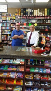 Sabri and son Robert Shamoun behind the counter at OB Quik Stop.