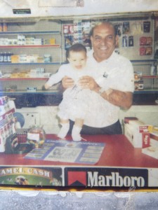 Sabri and baby daughter Larissa in one of his stores. Larissa now works as a staff accountant at RJS LAW.