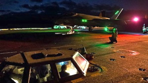 An F-35C Lightning II carrier variant Joint Strike Fighter conducts its first carrier-based night flight operations aboard the aircraft carrier USS Nimitz. Navy photo