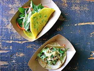 Rice crepe with daikon cake and kimchi tacos. (Credit: Yesica/Flickr)