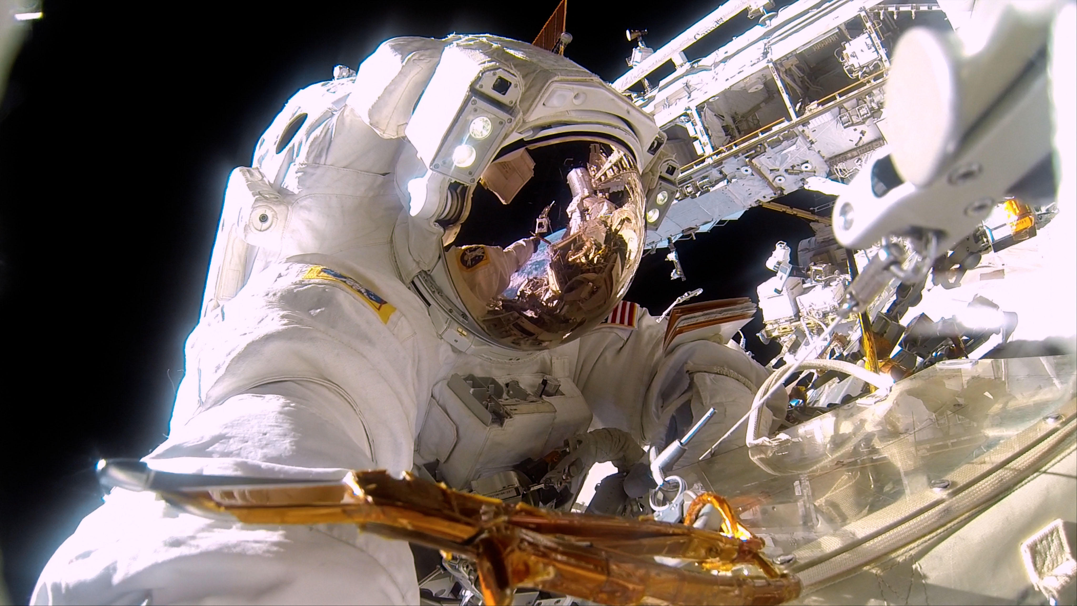 A NASA astronaut on a spacewalk to repair the exterior of the International Space Station. It’s almost 300° on the sun side of the space station and -275° in the shade.