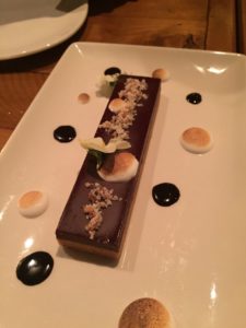 Desserts include chocolate peanut butter ball, beautifully presented. 