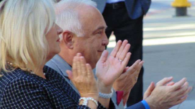 Ron and Alexis Fowler applaud during the ceremony at San Diego State University. (Photo by Chris Jennewein)