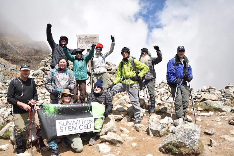Hikers who have Parkinson’s Disease celebrate at the summit.