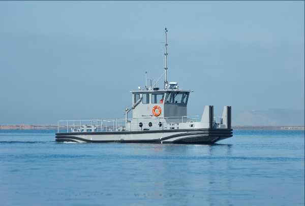  A tugboat built by a Port of San Diego business, Marine Group Boat Works, is delivered to the U.S. Navy in the Port of Sasebo, Japan. (Photo courtesy: Stephen Whalen Photography.)