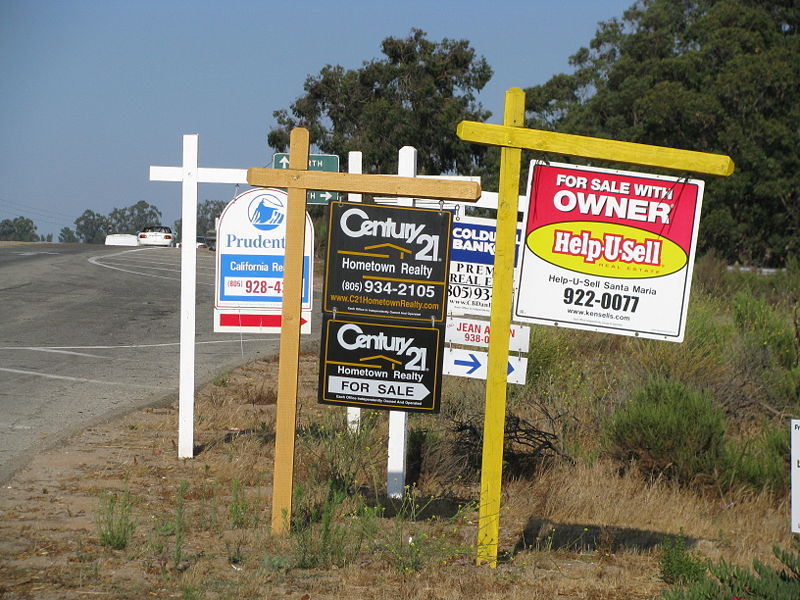 For sale signs in California. (Photo via Wikimedia Commons)
