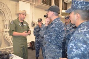 Lt. Clay Greunke, assigned to SPAWAR, explains to sailors on board the amphibious transport dock ship USS Anchorage how three-dimensional images were produced during a ship scan event of various shipboard spaces. (U.S. Navy photo by Dawn Stankus)
