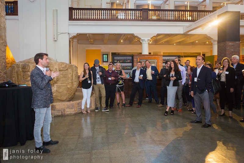 BizX Chief Growth Officer Daniel Kosh talks with a collection of local business owners and community leaders at the BizX San Diego launch event.