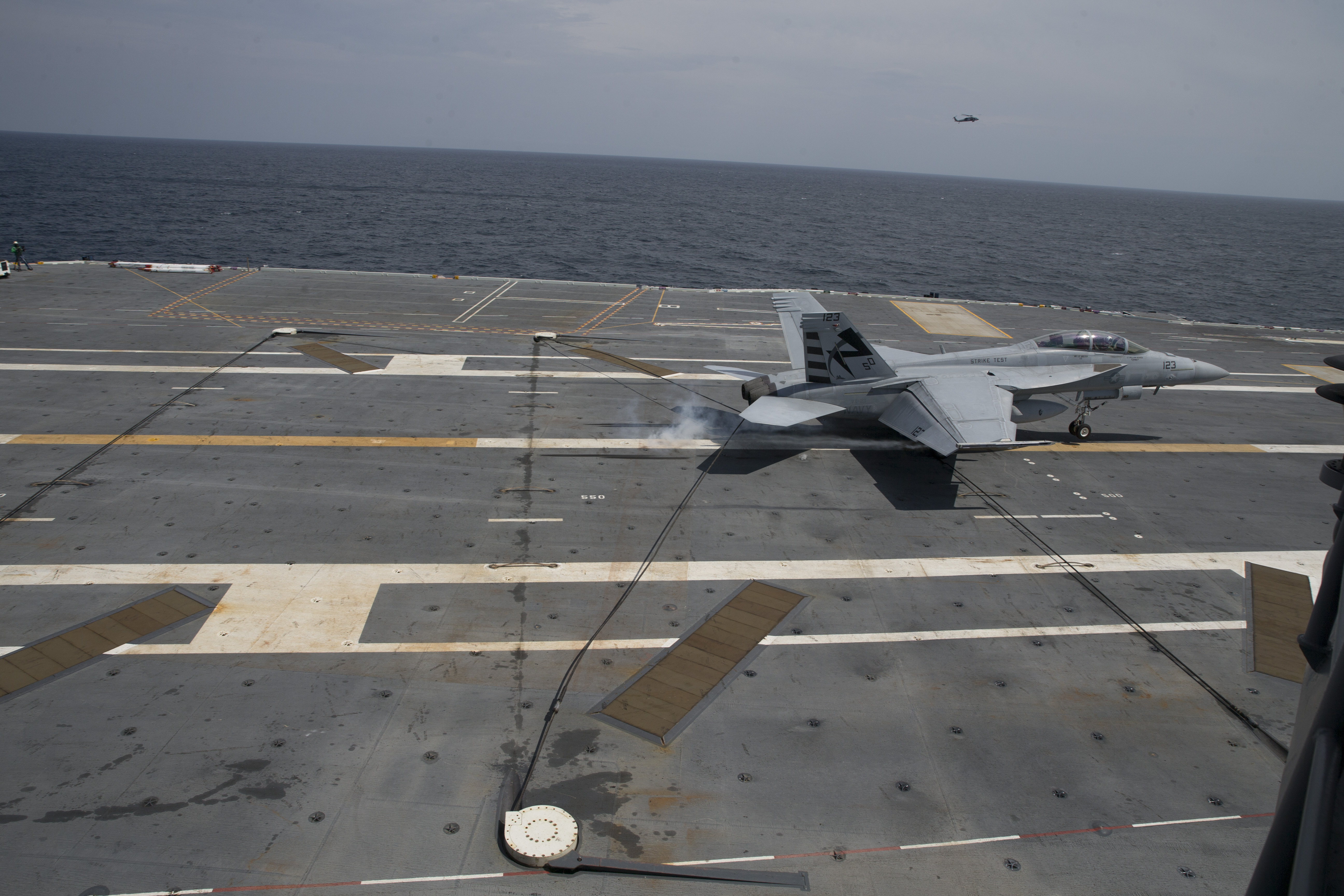 An F/A-18F Super Hornet performs an arrested landing aboard USS Gerald R. Ford. (U.S. Navy photo by Mass Communication Specialist 3rd Class Cathrine Campbell)