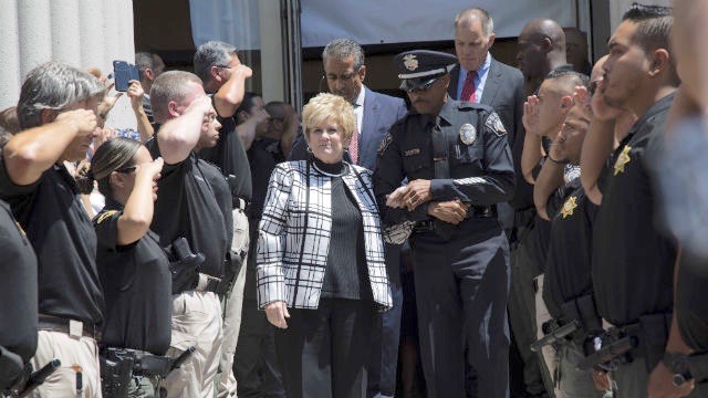 Bonnie Dumanis is saluted as she leaves her office for the last time. (Photo ourtesy of the District Attorney’s Office)