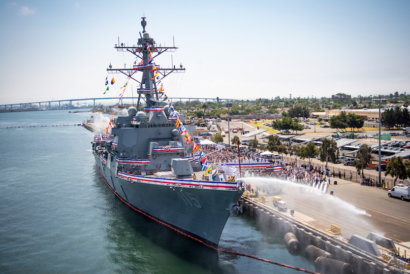 The crew mans the Arleigh Burke-class guided-missile destroyer USS Rafael Peralta during the ship's commissioning ceremony at Naval Air Station North Island on Saturday. Rafael Peralta honors Marine Corps Sgt. Rafael Peralta, who was posthumously awarded the Navy Cross for actions during Operation Iraqi Freedom. U.S. Navy photo by Mass Communication Specialist 2nd Class Zackary Alan Landers 