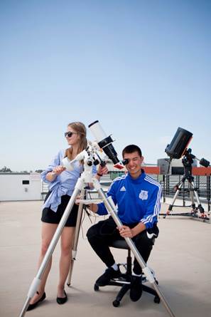 Miramar College students using a solar telescope on the roof of the college’s Science Building. Similar telescopes will be available to students at each of the district’s colleges.