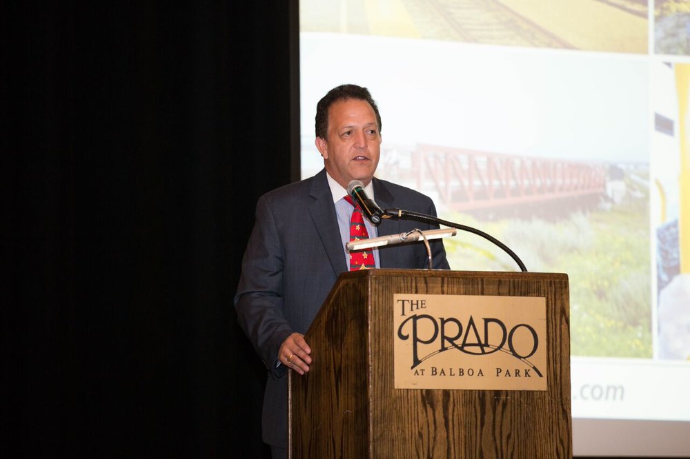 Gary Gallegos speaking at a 2015 meeting of the San Diego Highway Development Association (Credit: San Diego Transportation Development Association)