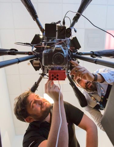 Northrop Grumman engineers Charlie Welch and Greg Kravit work on their hexacopter sensor suite in the San Diego FabLab.