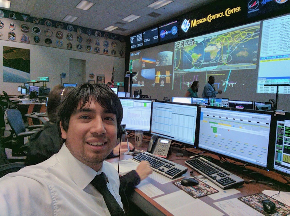 Sergio Sandoval at his desk at NASA.