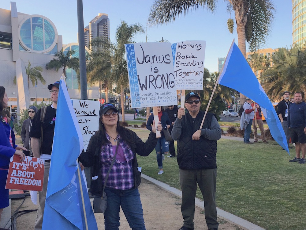 Union members protest the Janus case at the California Democratic Party convention in San Diego. (Photo by Laurel Rosenhall/CALmatters)