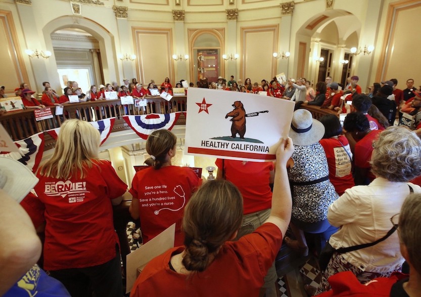 The California Nurses Association leads a rally for the single-payer health care bill at the Capitol in June 2017. (AP Photo/Rich Pedroncelli)
