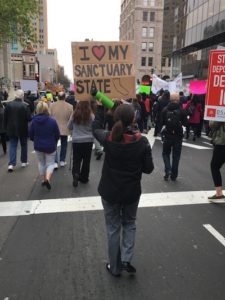 Marchers in Sacramento protest federal immigration policies. (Photo by Trevor Eischen for CALmatters)