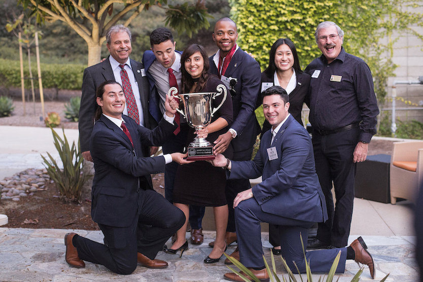 Back row: Kamal Haddad (chair of Finance Department at SDSU), Trey Golston, Cristian Goodson, Shelly Chen, Mark Goldman. Front row: Jeremiah Taylor, Holly Miller, Nick Zalkow. (Photo credit: Jamie Murray, www.JamieM urray Photography.com)