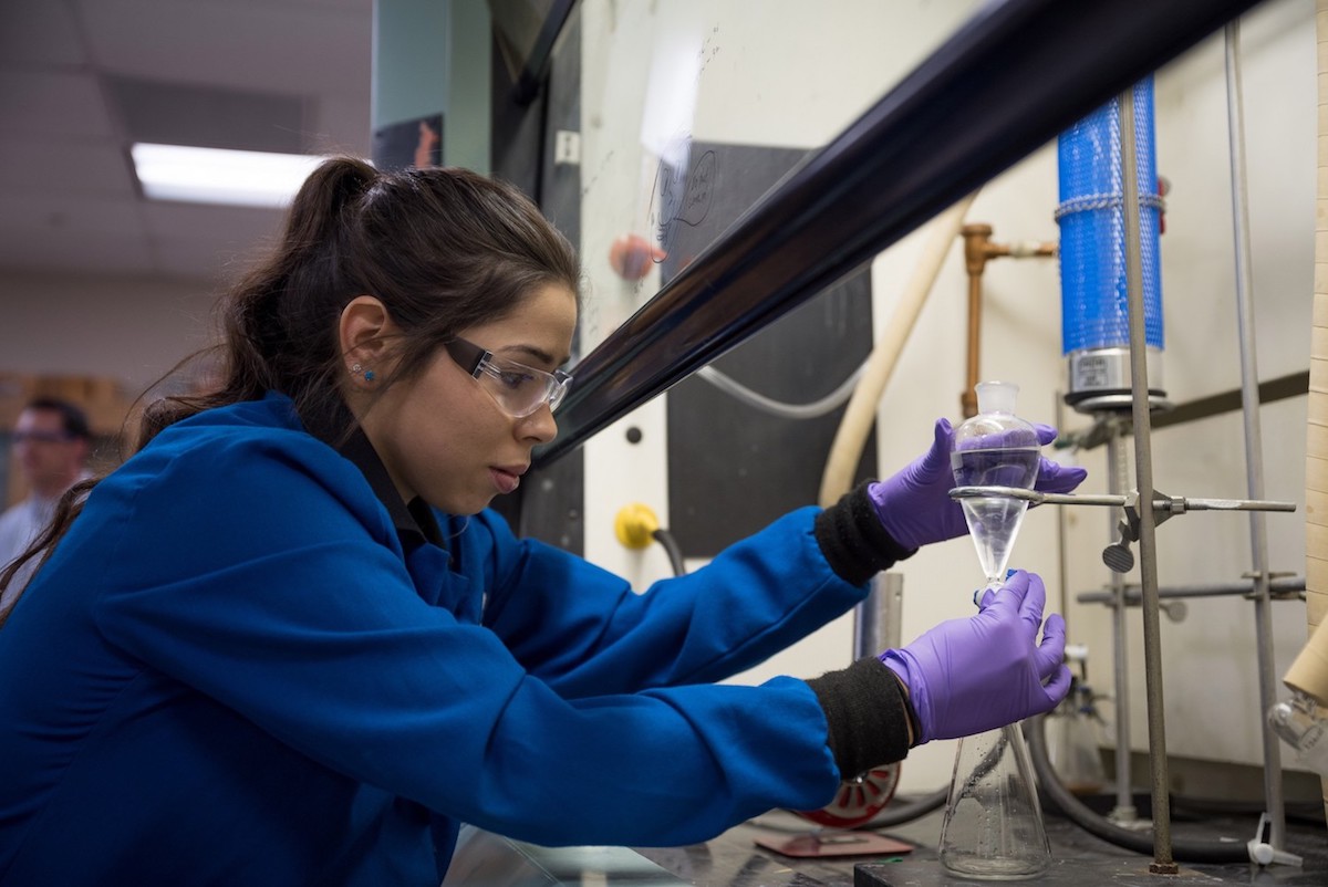 Jenny Veyna works in a lab at Cal State San Marcos (Photo: Niky Matousek)