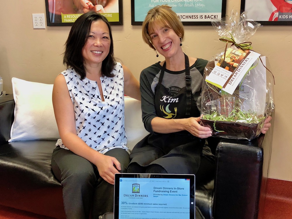 Renee Zau, left, CEO and co-founder of DonationMatch, with Kim Martin, store manager at Dream Dinners Del Mar-Solana Beach.