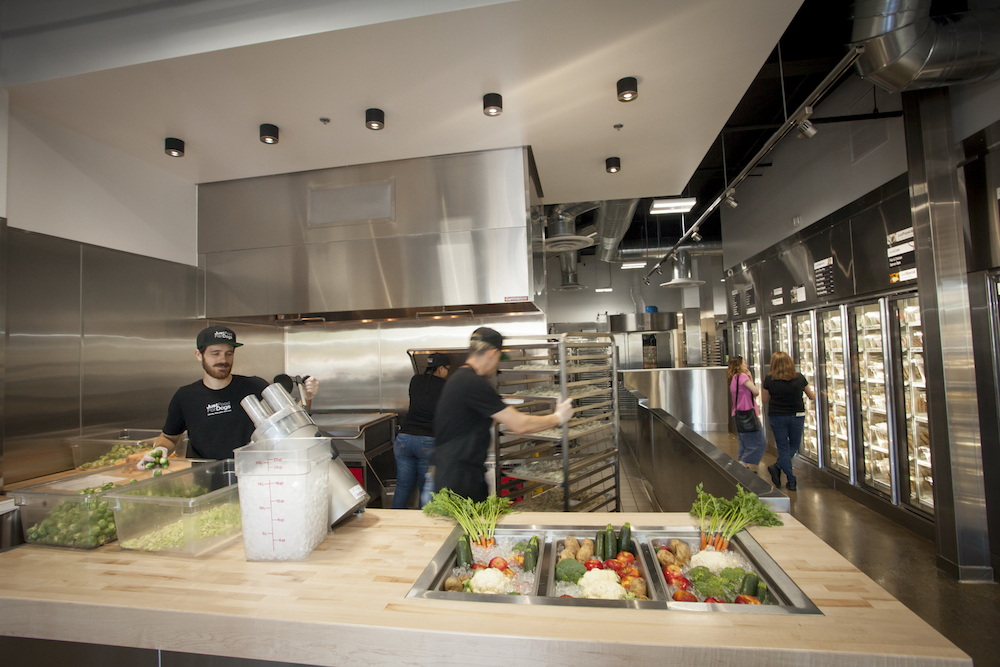 The first Petcos featuring JustFoodForDogs are in San Diego County — Point Loma and San Marcos. Point Loma’s Petco will feature the exhibition kitchen (above is an example), while the San Marcos store will feature a pantry.