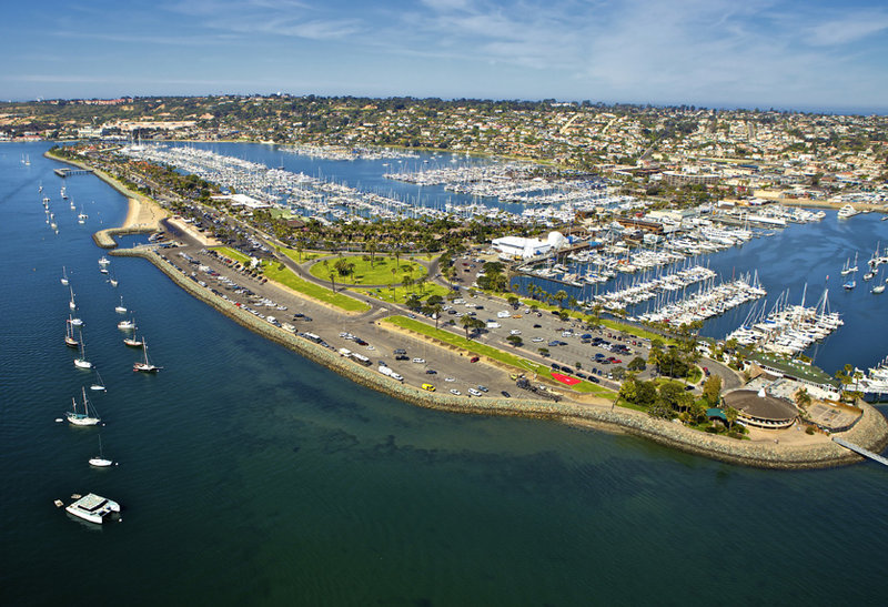 Aerial view of current Shelter Island. The island, created with dredging spoils in 1934, remained vacant until 1953 when the landfill settled and the road was built. (Photo courtesy of Shelter Island Hotel Group)