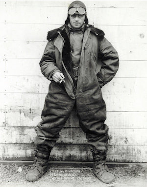 Wild Bill Hobson shows off the flight suits worn by airmail pilots to battle the elements. (Photo courtesy of the San Diego Air & Space Museum)