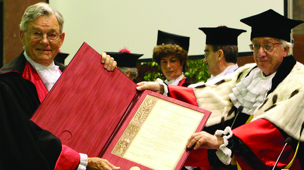 Dan Lindsley receiving an honorary degree in genetics and molecular biology from the University of Rome ‘La Sapienza’ for his studies on the development of Drosophila melanogaster. (Photo courtesy of UC San Diego)
