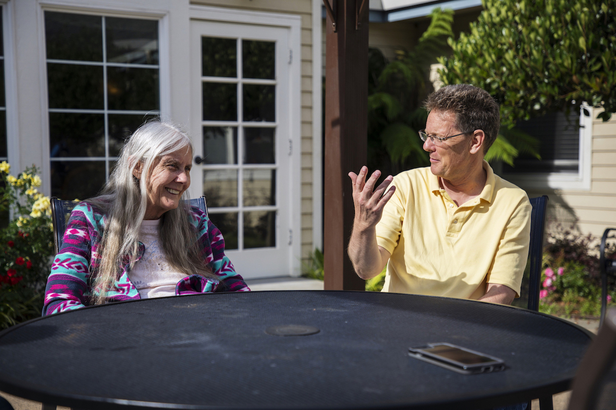 Sharron Evans and her nephew, Rob Lyman, at the assisted-living facility where she resides. (Photo by Robbie Short/CALmatters.jpg)