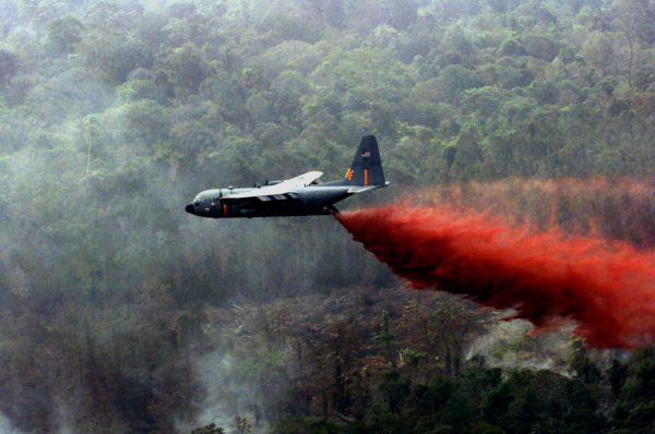 A National Guard C-130 dropping fire retardant. (File: Calmatters)