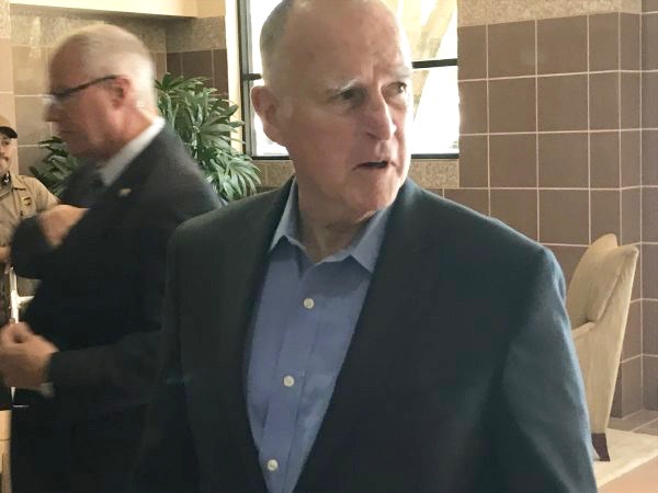 Gov. Jerry Brown arrives at the Community College Board of Trustees meeting. (Courtesy of Lucas Public Affairs)