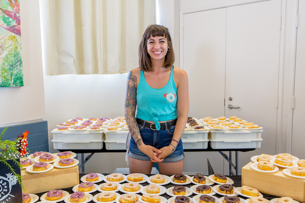 Amanda Hickethier from Nomad Donuts displays an assortment of doughnuts at the Farm to Bay event. (Photo courtesy of Living Coast Discovery Center)