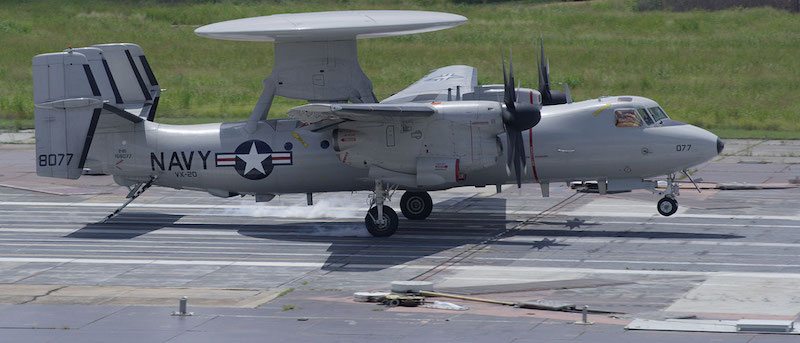 E-2D Advanced Hawkeye flies into the Advanced Arresting Gear wire at the Runway Arrested Landing Site in New Jersey (U.S. Navy Photo).