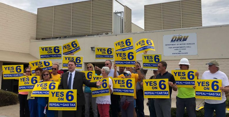 Carl DeMaio, chairman of the Yes on 6 Gas Tax Repeal campaign, and supporters in front of a DMV office. (Photo courtesy of Reform California-Yes on 6)