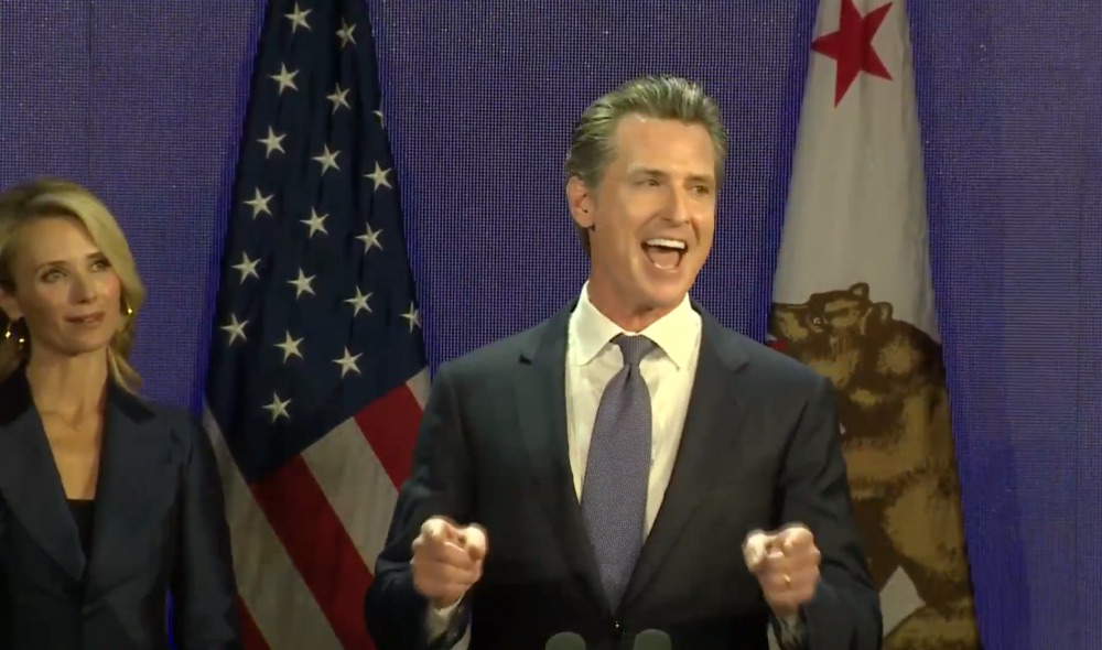 Gov.-elect Gavin Newsom on election night, with his wife, Jennifer Siebel Newsom. (Credit: CALmatters)