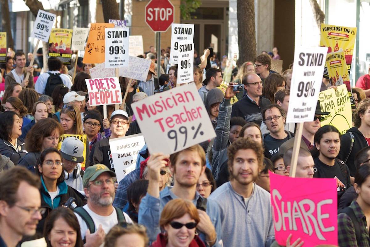 File photo of Oakland inequality protest by Brian Sims via Creative Commons.