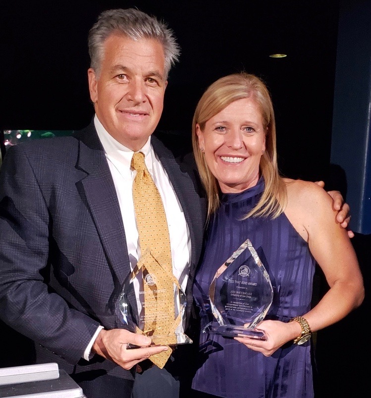 Mark Castellano and Jodi Waterhouse with awards.