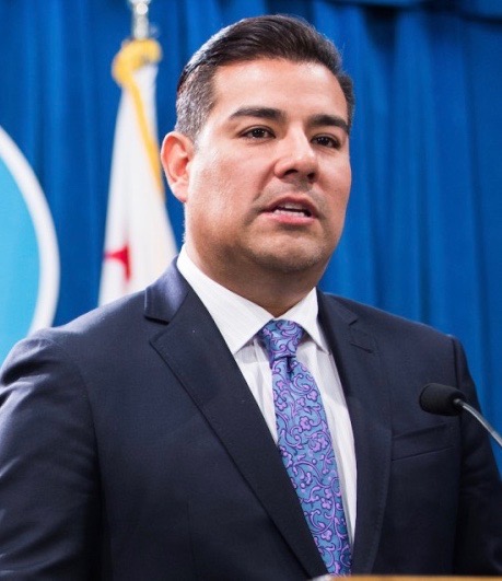Incoming Insurance Commissioner Ricardo Lara, shown here at CALmatters’ office in October, has hired a former lobbyist for the drug maker Gilead to help lead his transition. The Department of Insurance is investigating the company. (CALmatters photo)