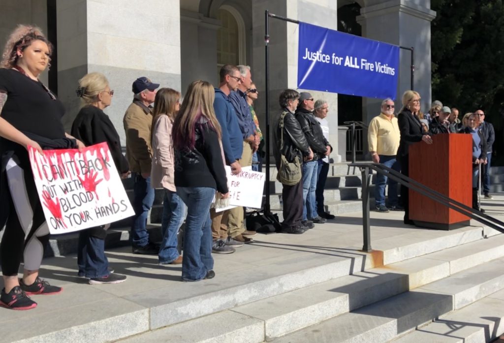 Wildfire victims and supporters join Erin Brockovich in calling on lawmakers to hold PG&E accountable for recent wildfires. Photo by Judy Lin, CALmatters)