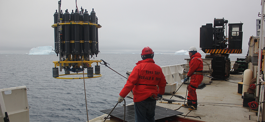 Crew of NOAA Ship Ronald M. Brown deploy a CTD, an instrument that collects ocean temperature and other data. (Courtesy of Scripps Institution of Oceanography)