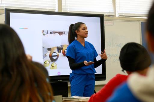 University City High School student Josielyn Fishel gives a presentation during an Oral Communications 103 class taught by Miramar College adjunct professor Barbara Ann Bush.