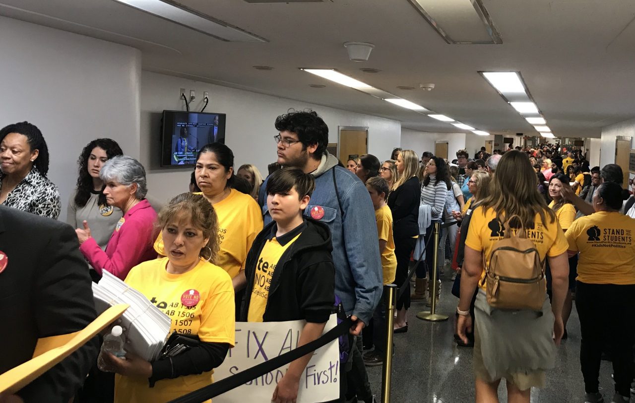 Charter school advocates and teachers unions mass at the Capitol on April 10, as state lawmakers consider dramatic curbs on charter schools. (Photo for CALmatters by Dan Morain)