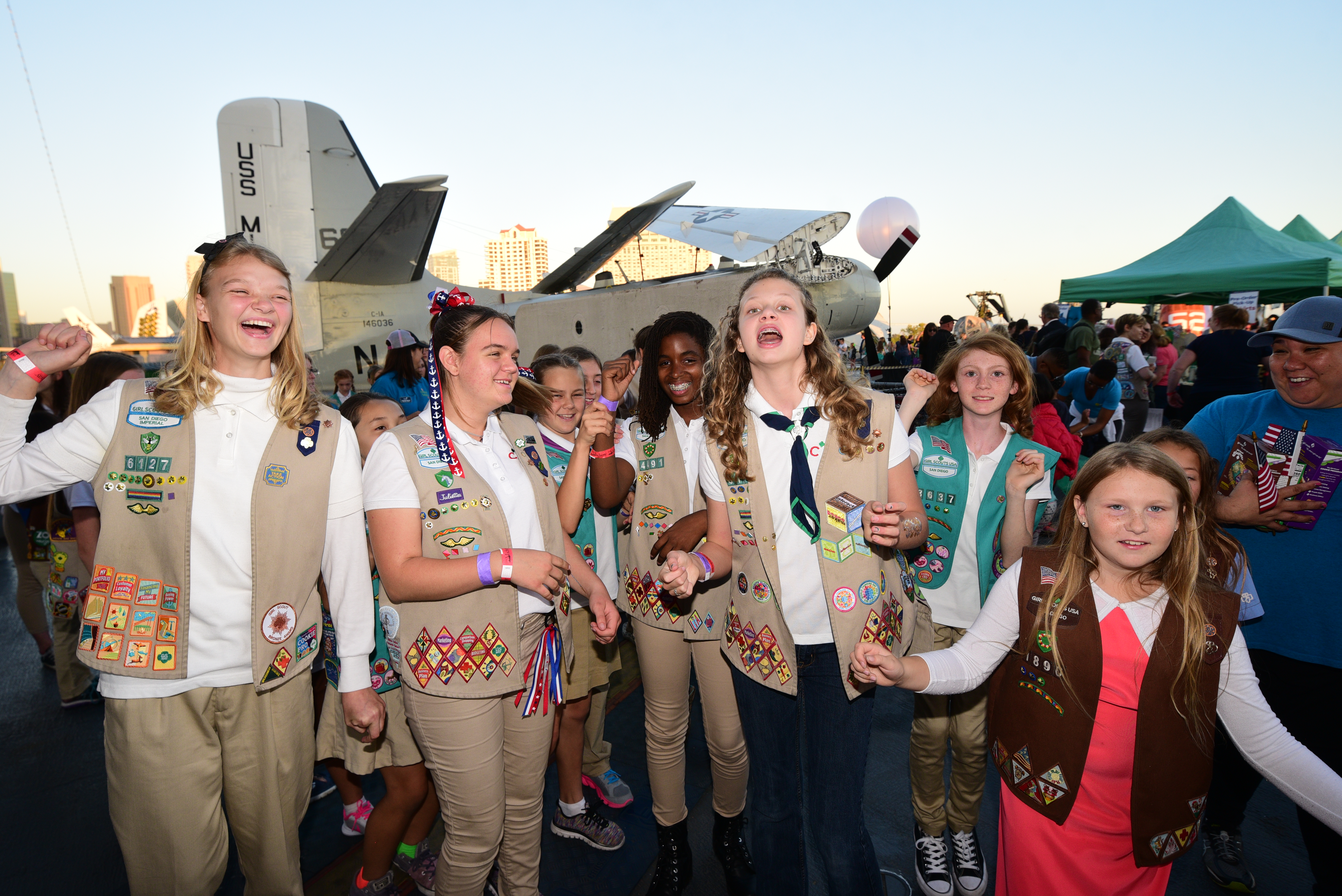 Scene from last year’s Operation Thin Mint Sendoff aboard the USS Midway Museum. It included Christina Bailey, this year’s top-ranked Girl Scout in the region for cookie sales (pictured above, far left). This year’s Sendoff is May 10 at the Midway.