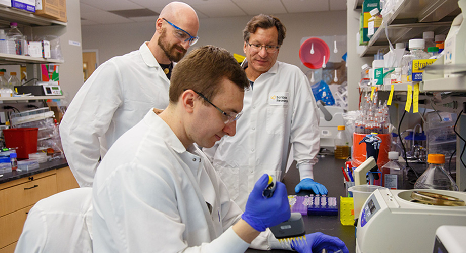Co-first authors Mathew Gardner, PhD, and Christoph H. Fellinger, PhD, worked closely with mentor Michael Farzan, co-chairman of the Scripps Research Department of Immunology and Microbiology. (Photo courtesy of Scripps Research)